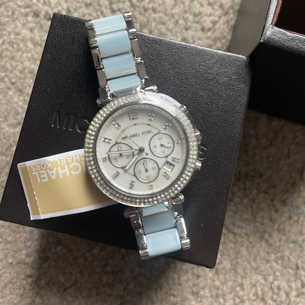 New in box, tags attached. MK watch